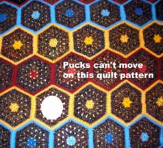 A cone unable to move on a hexagon afgan, Quilt Hopper design by Ken Young, constructino by Jo Anne Young