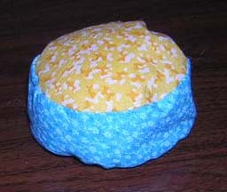 Photo of a Quilt Hopper puck. Design by Ken Young, construction by Jo Anne Young